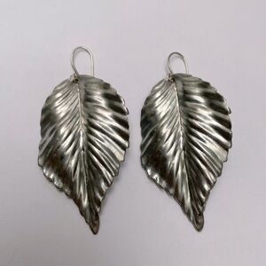 Silver tone dangly leaf earrings
